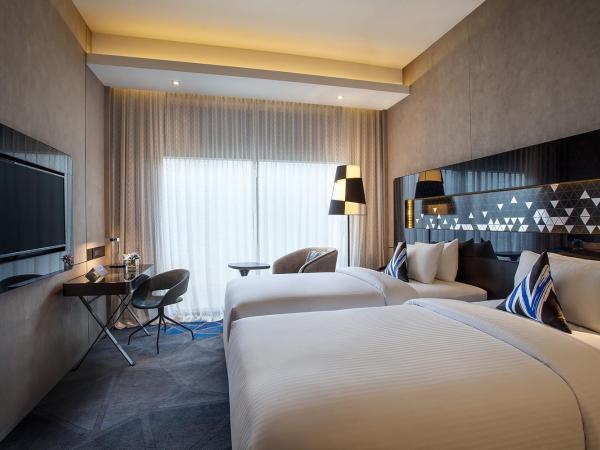 Novotel Singapore On Stevens : photo 1 de la chambre chambre lits jumeaux deluxe