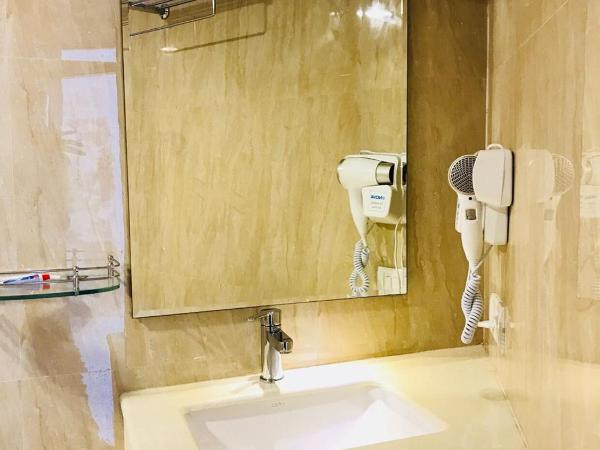 Hotel Royal Inn - Electronic City : photo 5 de la chambre chambre deluxe