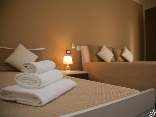 SalernoPrestige rooms : photo 3 de la chambre chambre triple