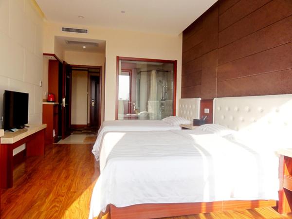 Hua Qi Kaiserdom Hotel Zhongshan Road St Michael's Cathedral and Zhanqiao Pier Qingdao : photo 3 de la chambre chambre familiale deluxe