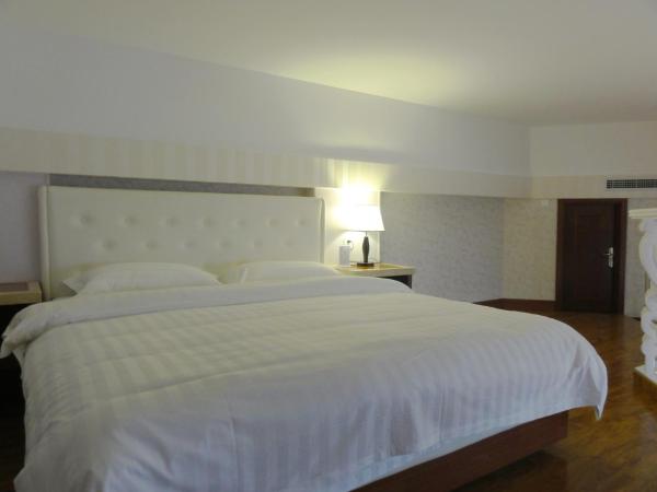 Hua Qi Kaiserdom Hotel Zhongshan Road St Michael's Cathedral and Zhanqiao Pier Qingdao : photo 6 de la chambre suite en duplex