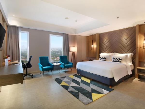 Swiss-Belinn Simatupang : photo 1 de la chambre suite affaires
