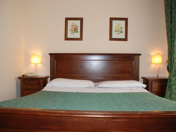 Hotel del Centro : photo 9 de la chambre chambre triple