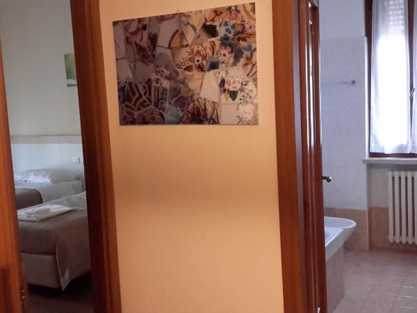 B&B Il Mondo Di Ross : photo 4 de la chambre chambre double de luxe avec salle de bains privative - vue sur jardin