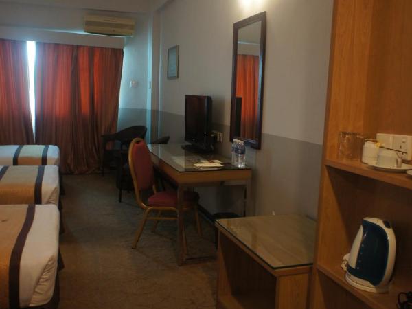 Tyng Garden Hotel : photo 3 de la chambre chambre triple deluxe