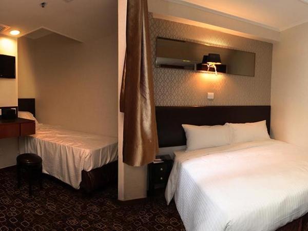 Lander Hotel Prince Edward : photo 1 de la chambre chambre triple