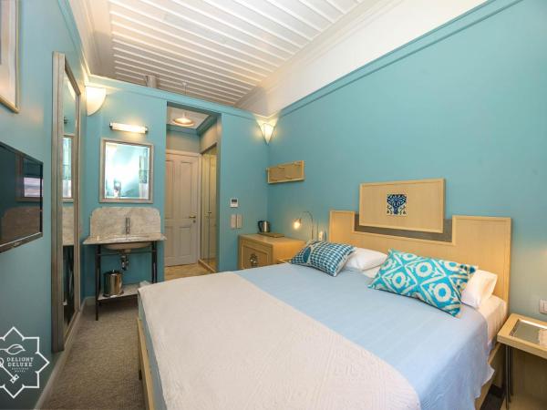 Delight Deluxe Hotel : photo 2 de la chambre chambre simple deluxe