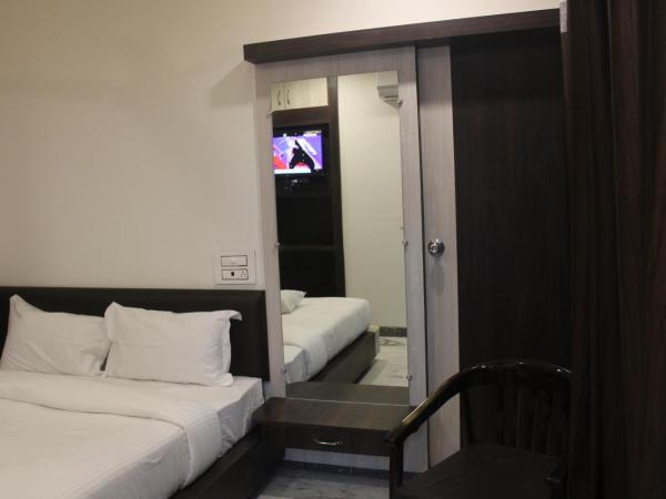 Hotel Delight : photo 7 de la chambre chambre double deluxe (2 adultes + 1 enfant)