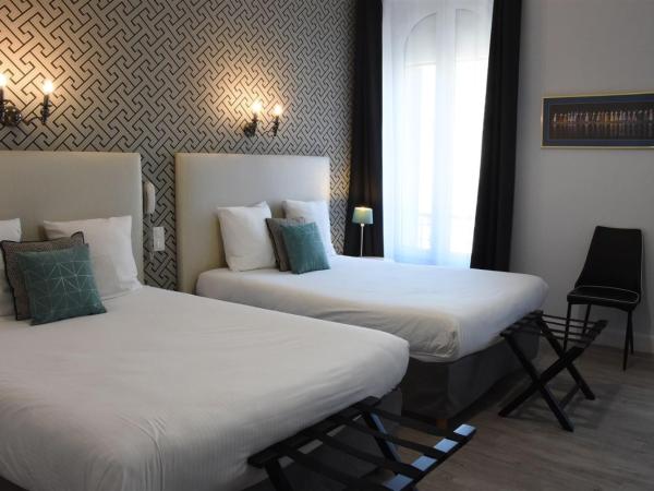 Régina Boutique Hotel : photo 1 de la chambre chambre lits jumeaux supérieure