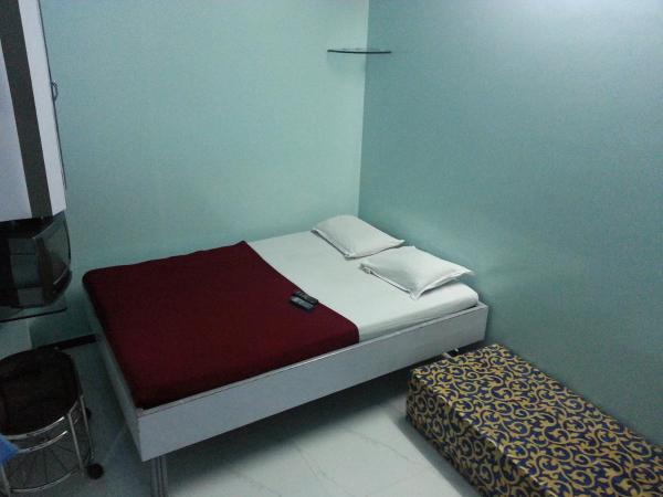 New Metro Guest House : photo 5 de la chambre chambre triple deluxe