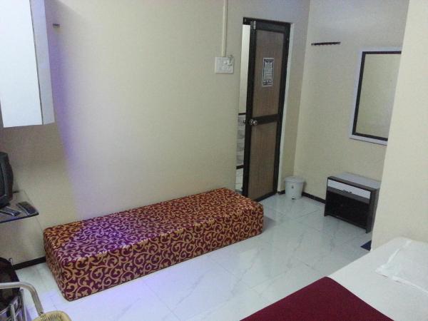 New Metro Guest House : photo 1 de la chambre chambre triple deluxe