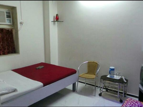 New Metro Guest House : photo 3 de la chambre chambre double deluxe avec baignoire