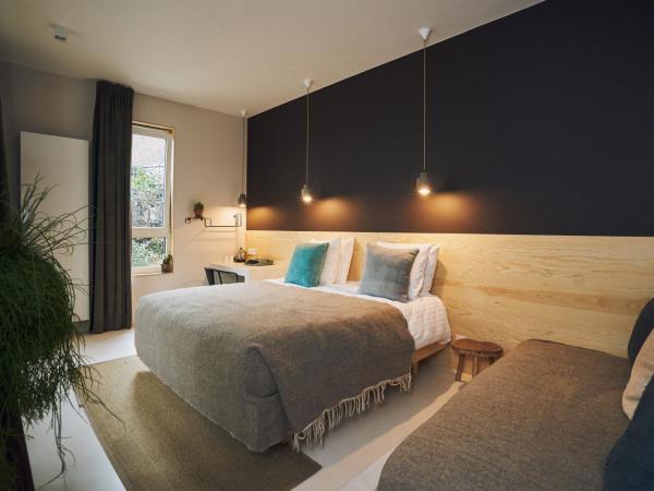 Jardin Secret : photo 1 de la chambre chambre triple - vue sur jardin