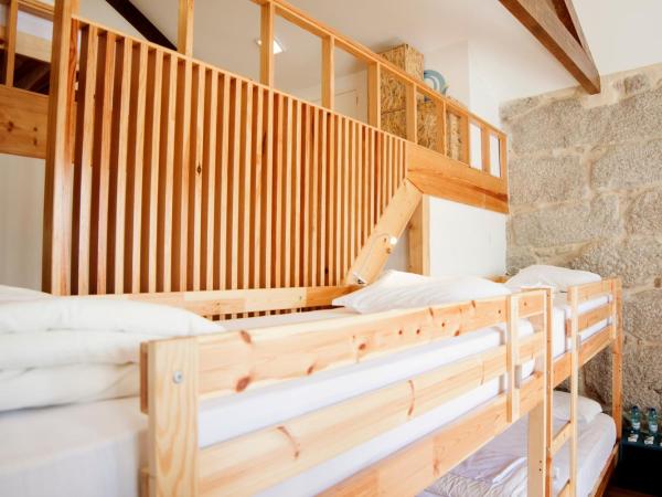 Happy Porto Hostel & Apartments : photo 6 de la chambre lit dans dortoir mixte de 12 lits