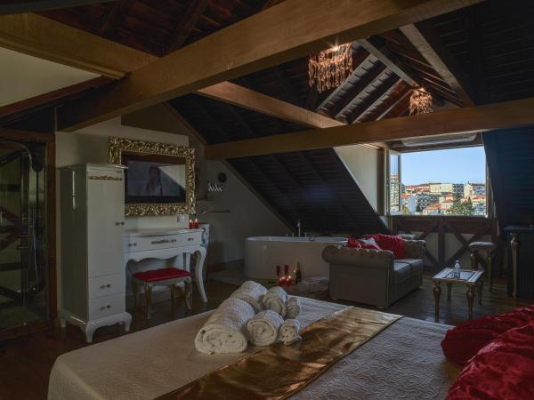 Solar Antigo Luxury Coimbra : photo 1 de la chambre suite deluxe avec lit king-size