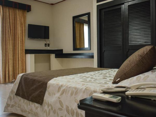 Suites Los Arcos : photo 1 de la chambre chambre lit queen-size