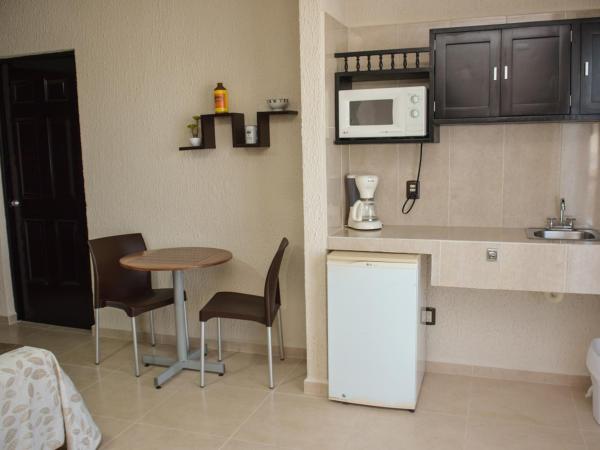 Suites Los Arcos : photo 3 de la chambre chambre lit queen-size