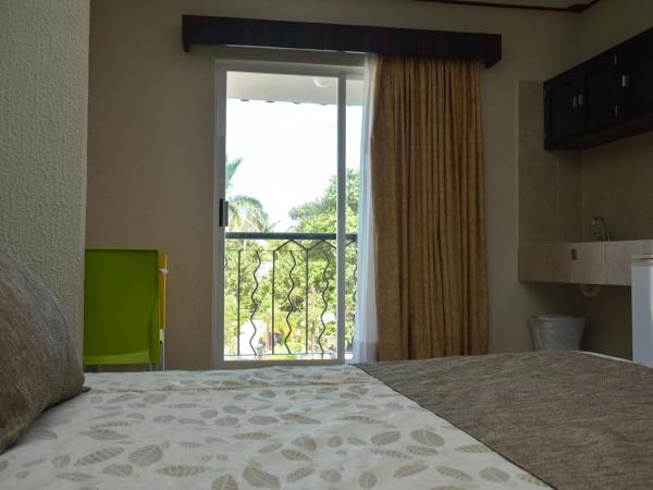 Suites Los Arcos : photo 1 de la chambre chambre quadruple