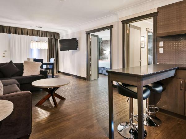 Best Western Plus Village Park Inn : photo 1 de la chambre suite lit king-size – non-fumeurs