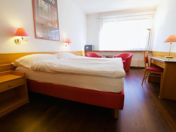 Hôtel du Rhône : photo 3 de la chambre chambre quadruple