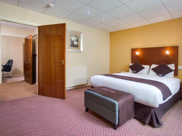Apollo Hotel : photo 1 de la chambre suite lit queen-size