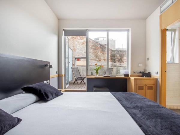 Onix Liceo : photo 1 de la chambre chambre double ou lits jumeaux avec terrasse