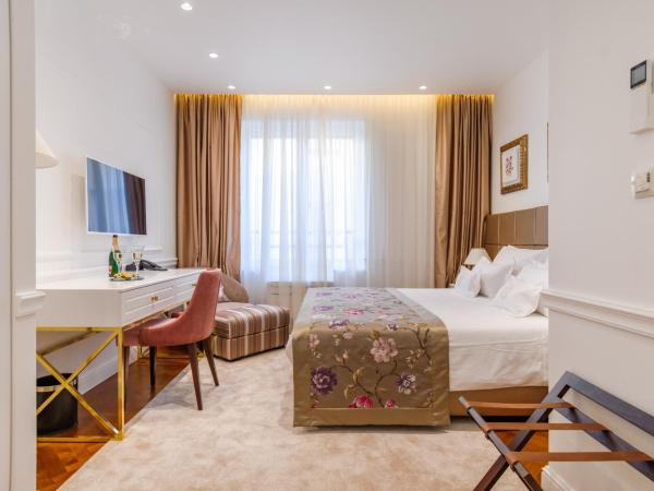 Ann Luxury Rooms : photo 7 de la chambre chambre deluxe double ou lits jumeaux