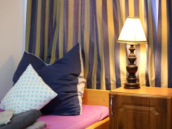 Hív-Lak Apartman : photo 6 de la chambre chambre familiale avec salle de bains privative