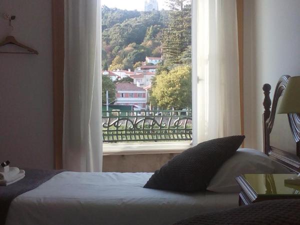 A Vianesa - Guest House : photo 1 de la chambre chambre triple avec salle de bains commune