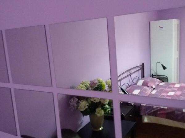 Petaluda House 1 : photo 4 de la chambre chambre double supérieure avec salle de bains commune