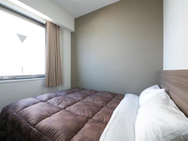 R&B Hotel Shin Osaka Kitaguchi : photo 4 de la chambre chambre double - non-fumeurs