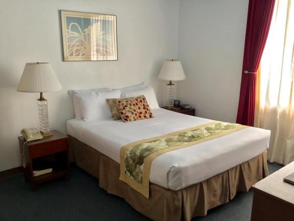 Holiday Surf Hotel (with full kitchen) : photo 2 de la chambre studio lit queen-size