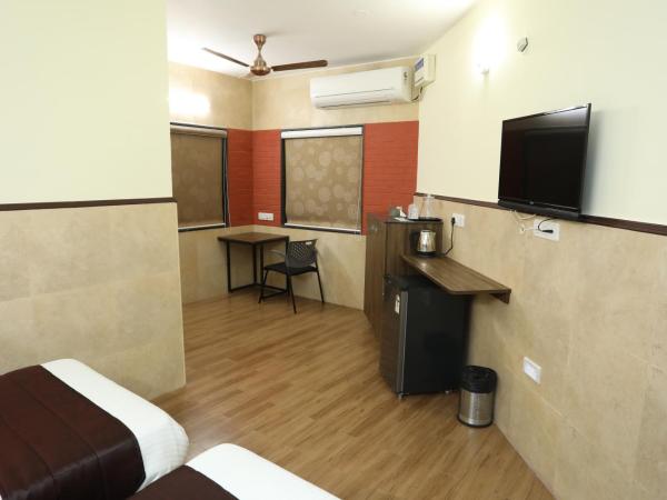 Season 4 Residences - Nungambakkam Near US consulate, Apollo Hospital, Shankar Nethralaya : photo 9 de la chambre suite familiale