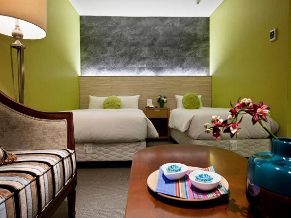 Central Tourist Hotel : photo 1 de la chambre chambre familiale deluxe