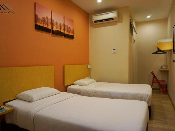 Tropical Villa Kuantan : photo 2 de la chambre chambre lits jumeaux standard