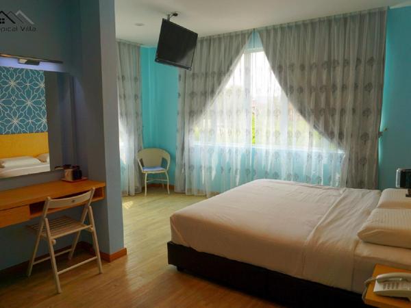 Tropical Villa Kuantan : photo 2 de la chambre chambre lit king-size deluxe