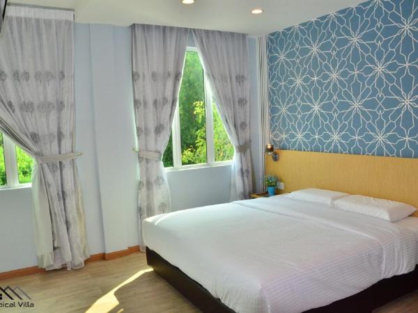 Tropical Villa Kuantan : photo 1 de la chambre chambre lit king-size deluxe