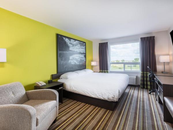 Super 8 by Wyndham Winnipeg East MB : photo 1 de la chambre chambre lit king-size - non-fumeurs
