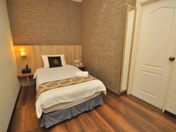 Art Cottage Hotel : photo 2 de la chambre chambre simple avec salle de bains privative