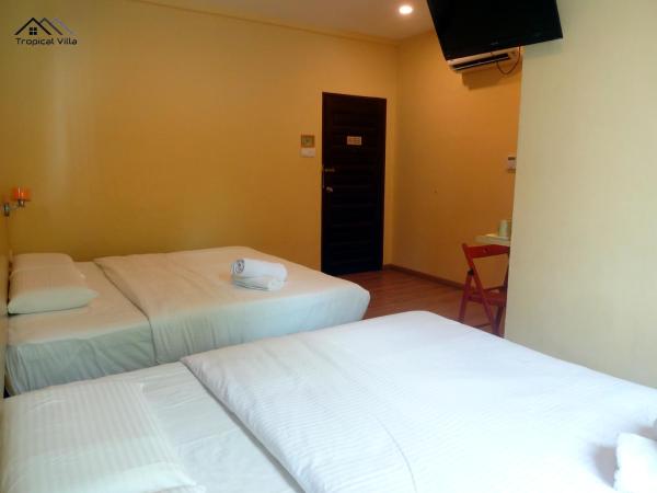 Tropical Villa Kuantan : photo 1 de la chambre chambre familiale supérieure