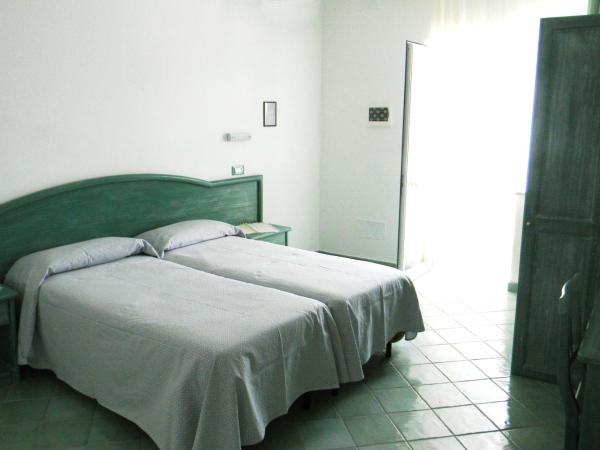 Albergo Villa Mario : photo 1 de la chambre chambre triple