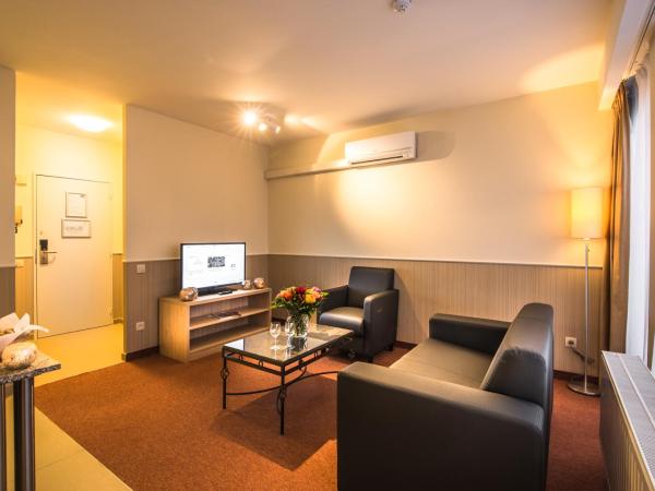 Arass Hôtel & Business Flats : photo 6 de la chambre appartement avec terrasse