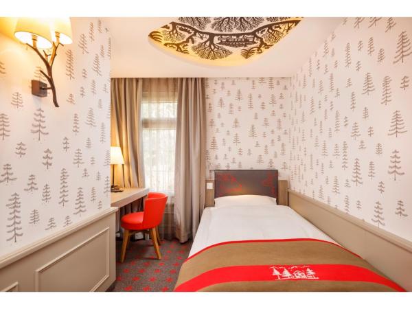 Swiss Night by Fassbind : photo 3 de la chambre chambre simple affaires 