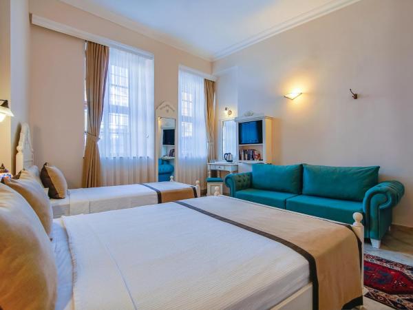 La Paloma Hotel : photo 2 de la chambre chambre triple avec jacuzzi