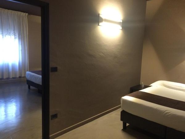 Hotel Mignon : photo 3 de la chambre chambre quadruple avec salle de bains privative