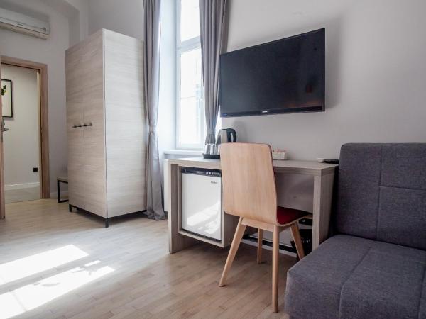 Zagreb City Vibe Apartments & Rooms : photo 3 de la chambre chambre double ou lits jumeaux avec lit d'appoint