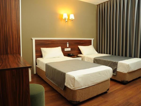 Deniz Palace Hotel : photo 2 de la chambre chambre double ou lits jumeaux - vue sur mer