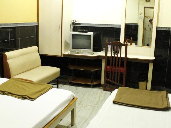 Greens Residency : photo 1 de la chambre chambre triple deluxe