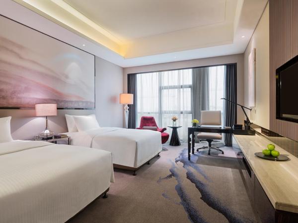 Wanda Realm Wuhan : photo 1 de la chambre chambre lits jumeaux deluxe