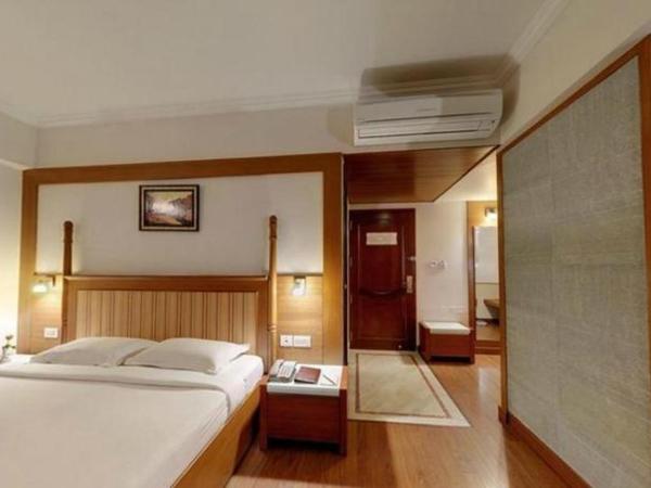 Parijatha Gateway : photo 2 de la chambre chambre double ou lits jumeaux - vue sur ville